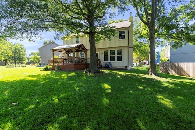 11808 W 128th St, Overland Park, KS 66213 - rear view of property featuring a chimney, a gazebo, and a deck