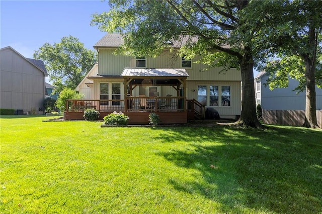 11808 W 128th St, Overland Park, KS 66213 - rear view of property featuring a deck and a lawn