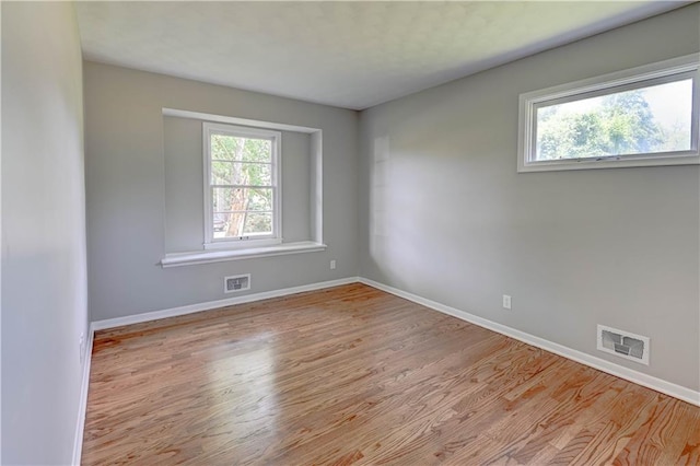 16300 E Independence Ave, Independence, MO 64050 - unfurnished room featuring wood finished floors and baseboards