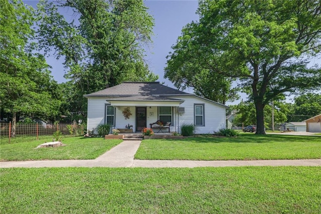 311 E Mary St, Yates Center, KS 66783 - bungalow-style house featuring covered porch