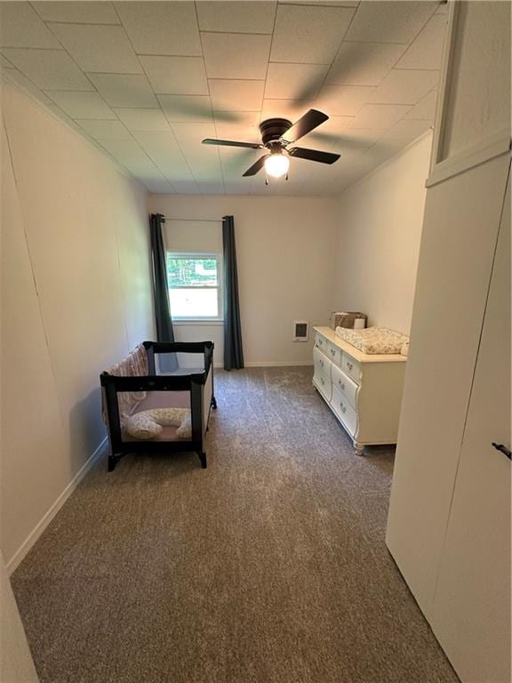317 Chrissenger St, Burlington Junction, MO 64428 - bedroom with dark carpet and a ceiling fan