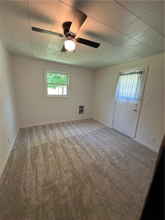 317 Chrissenger St, Burlington Junction, MO 64428 - unfurnished room with carpet and ceiling fan