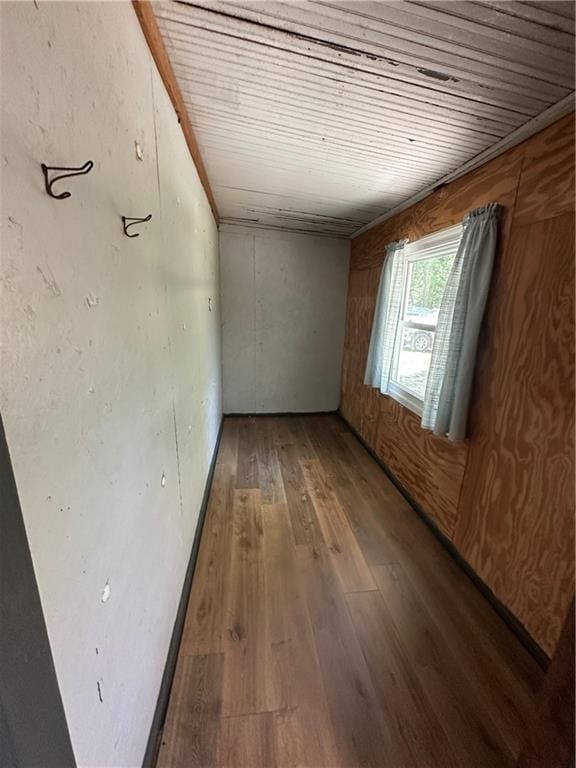 317 Chrissenger St, Burlington Junction, MO 64428 - unfurnished room featuring wooden ceiling and wood finished floors
