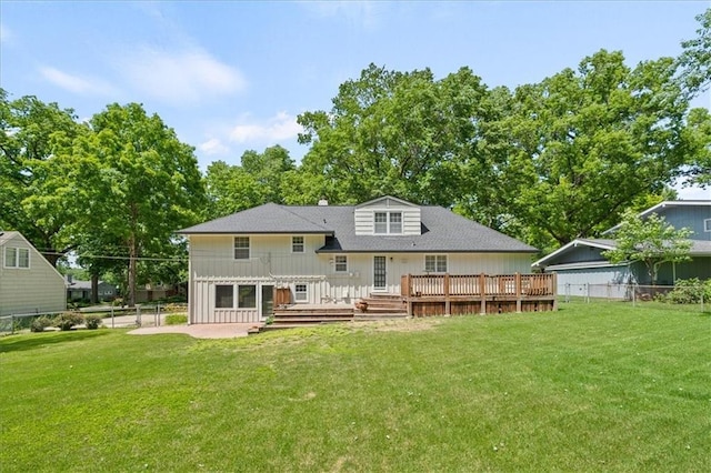 5211 W 79th Ter, Prairie Village, KS 66208 - rear view of house with a deck, board and batten siding, a patio, and a shingled roof