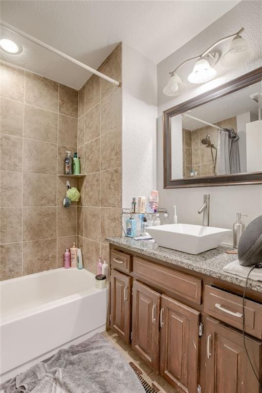 203 E Elm St, Olathe, KS 66061 - bathroom featuring vanity and shower / tub combo with curtain