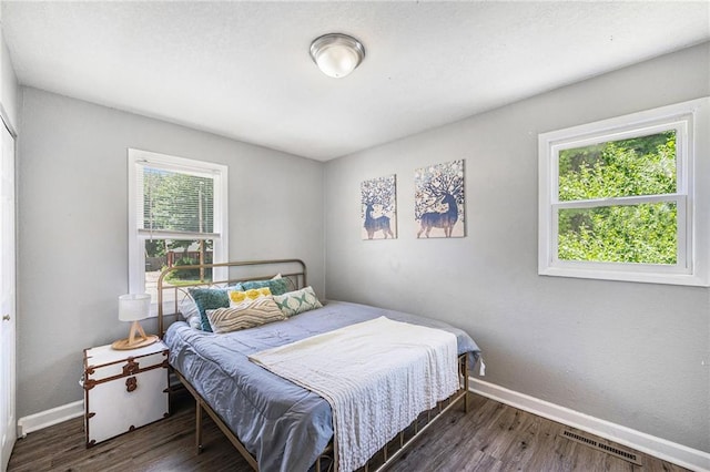 5117 Palmer Dr, Kansas City, MO 64129 - bedroom with wood finished floors