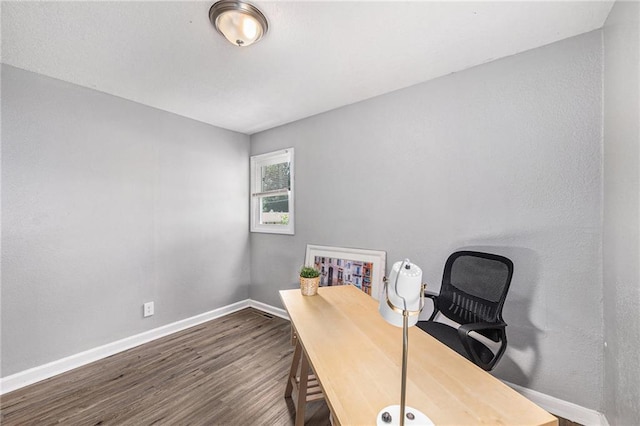 5117 Palmer Dr, Kansas City, MO 64129 - home office with wood finished floors and baseboards