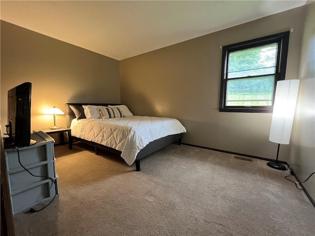 1423 Hickory St, Atchison, KS 66002 - bedroom featuring carpet and vaulted ceiling