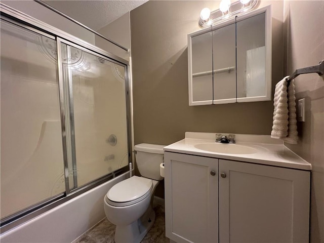 1423 Hickory St, Atchison, KS 66002 - full bathroom with vanity, combined bath / shower with glass door, and a textured ceiling