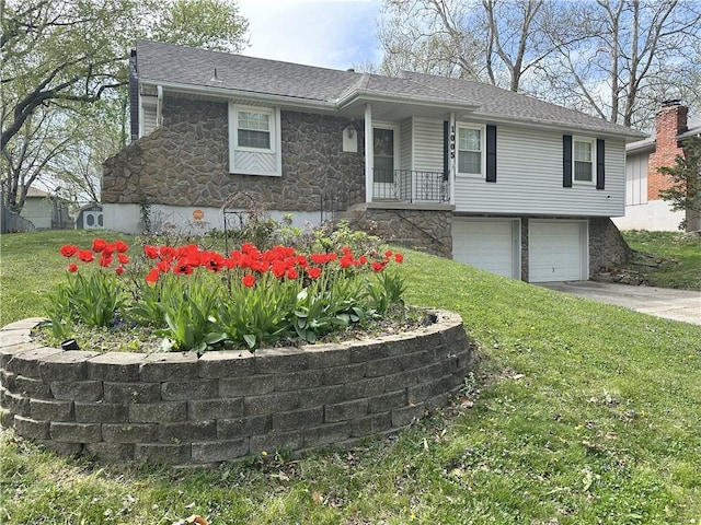 1005 SE Alice St, Blue Springs, MO 64014 - view of front facade featuring stone siding, an attached garage, a front yard, concrete driveway, and roof with shingles