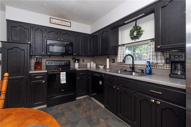 1005 SE Alice St, Blue Springs, MO 64014 - kitchen with black appliances, backsplash, stone finish flooring, and light countertops
