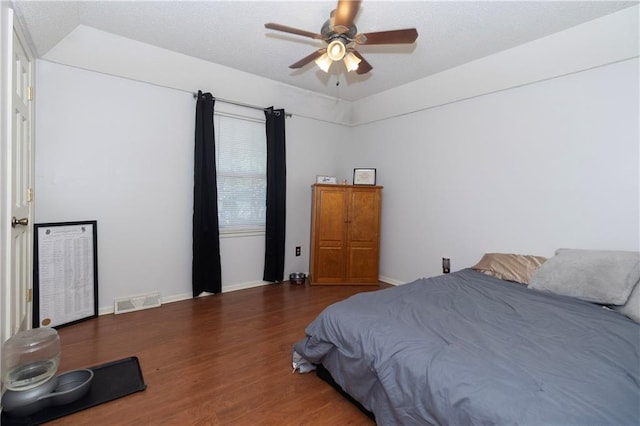 1005 SE Alice St, Blue Springs, MO 64014 - bedroom with wood finished floors and a ceiling fan