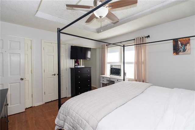 1005 SE Alice St, Blue Springs, MO 64014 - bedroom featuring dark wood-style flooring and ceiling fan