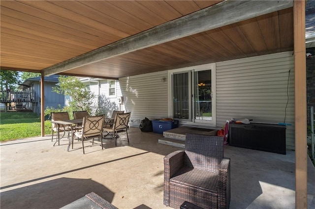 1005 SE Alice St, Blue Springs, MO 64014 - view of patio with outdoor dining area