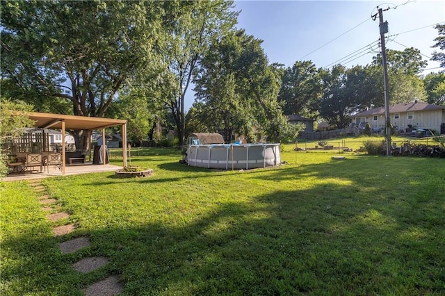 1005 SE Alice St, Blue Springs, MO 64014 - view of yard featuring an outdoor pool