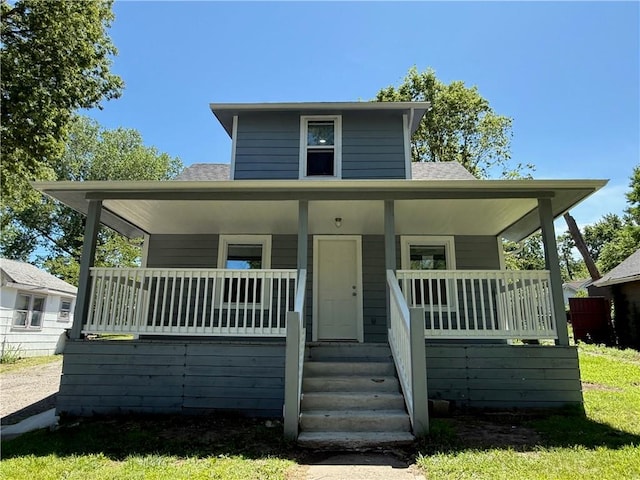 1515 S Home Ave, Independence, MO 64052 - view of front of property featuring a porch and roof with shingles