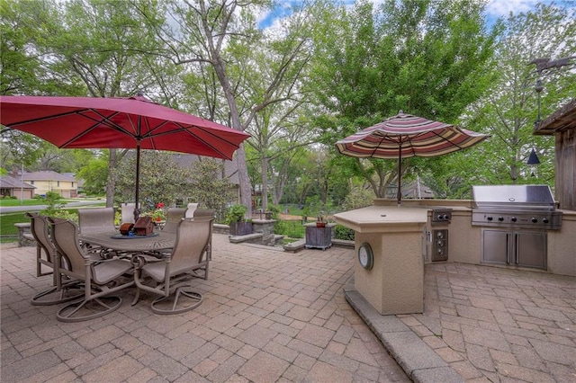 9015 Outlook Dr, Overland Park, KS 66207 - view of patio with area for grilling and outdoor dining area