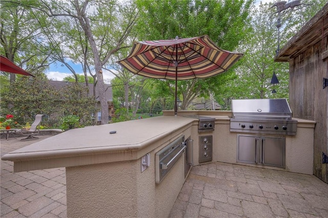 9015 Outlook Dr, Overland Park, KS 66207 - view of patio / terrace featuring area for grilling