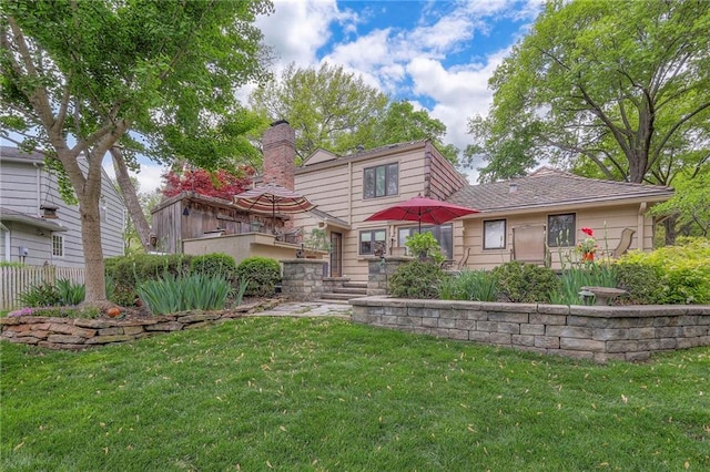 9015 Outlook Dr, Overland Park, KS 66207 - back of house with a chimney