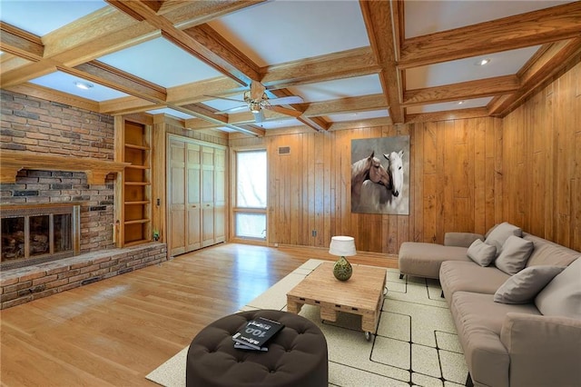 9015 Outlook Dr, Overland Park, KS 66207 - living room with wooden walls, wood finished floors, coffered ceiling, beam ceiling, and built in shelves