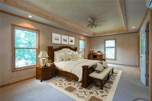 9015 Outlook Dr, Overland Park, KS 66207 - bedroom featuring light colored carpet, a raised ceiling, ornamental molding, recessed lighting, and a ceiling fan