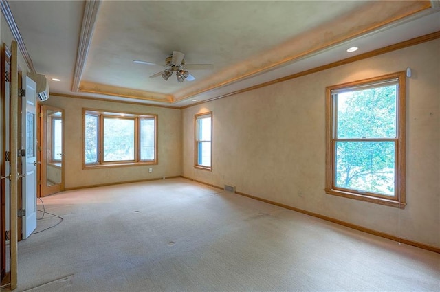 9015 Outlook Dr, Overland Park, KS 66207 - empty room featuring a wall mounted AC, a raised ceiling, a ceiling fan, light carpet, and recessed lighting