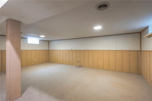 9015 Outlook Dr, Overland Park, KS 66207 - below grade area featuring carpet floors, a wainscoted wall, and wood walls