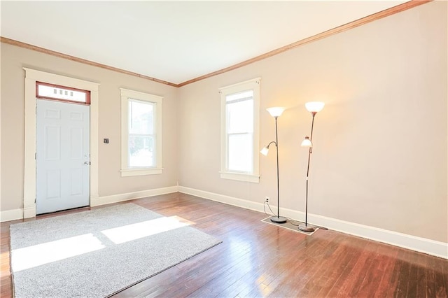 2627 Renick St, Saint Joseph, MO 64507 - foyer entrance with wood finished floors and ornamental molding