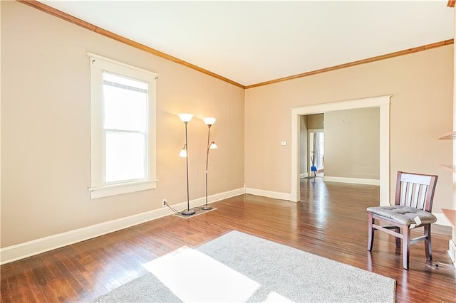 2627 Renick St, Saint Joseph, MO 64507 - spare room with crown molding and wood-type flooring