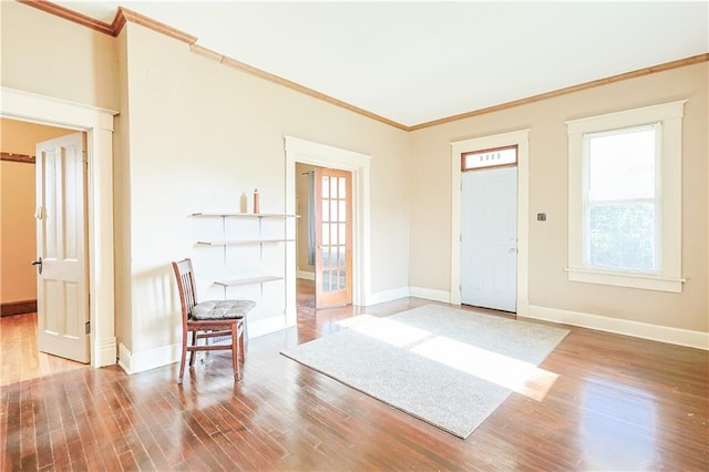 2627 Renick St, Saint Joseph, MO 64507 - entryway with ornamental molding and wood finished floors