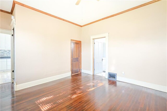 2627 Renick St, Saint Joseph, MO 64507 - empty room with crown molding, wood finished floors, and a ceiling fan