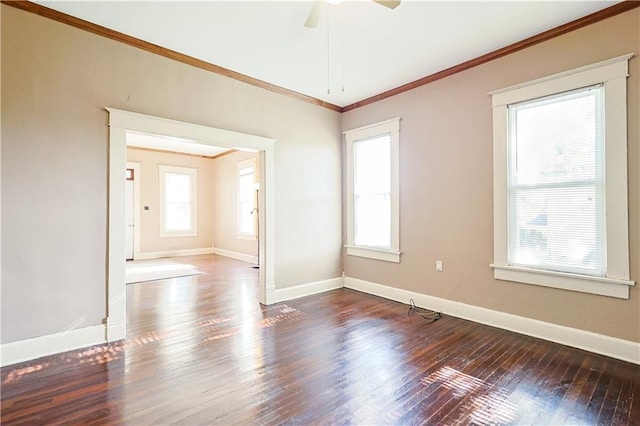 2627 Renick St, Saint Joseph, MO 64507 - unfurnished room featuring healthy amount of natural light, wood-type flooring, a ceiling fan, and crown molding