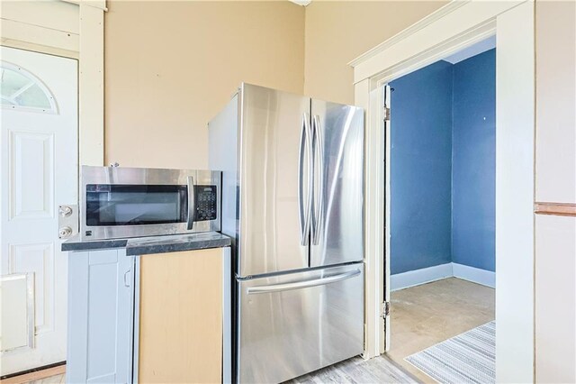 2627 Renick St, Saint Joseph, MO 64507 - kitchen with stainless steel appliances and dark countertops