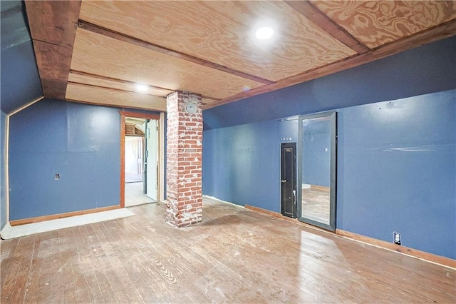 2627 Renick St, Saint Joseph, MO 64507 - empty room featuring hardwood / wood-style floors, recessed lighting, and ornate columns