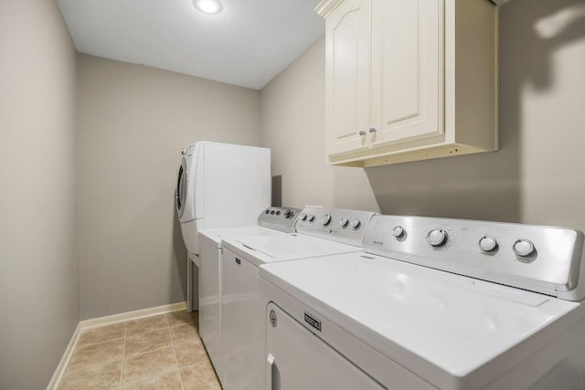 16211 S Locust St, Olathe, KS 66062 - laundry area with separate washer and dryer, cabinet space, and light tile patterned flooring