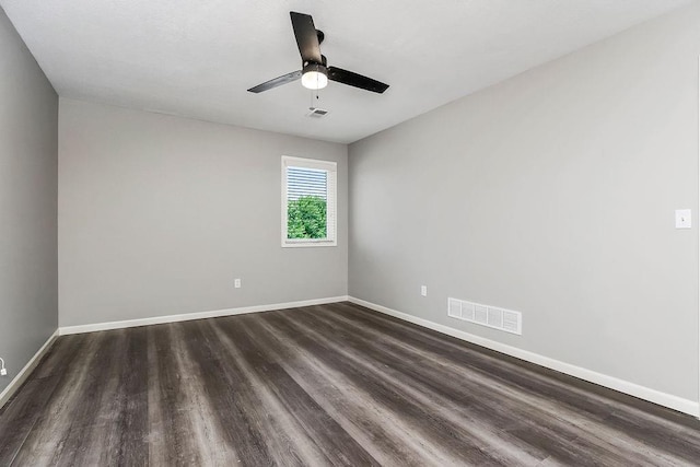 16211 S Locust St, Olathe, KS 66062 - unfurnished room featuring dark wood-style flooring and a ceiling fan