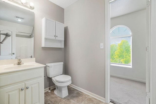 16211 S Locust St, Olathe, KS 66062 - bathroom featuring vanity, a shower, and tile patterned floors