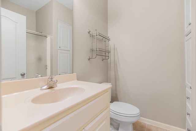 16211 S Locust St, Olathe, KS 66062 - bathroom with vanity, tile patterned flooring, and a shower
