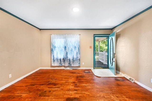 2704 Garland St, Leavenworth, KS 66048 - spare room with wood finished floors and ornamental molding