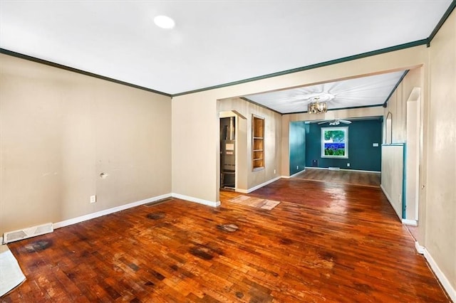 2704 Garland St, Leavenworth, KS 66048 - spare room featuring crown molding, a chandelier, and hardwood / wood-style floors