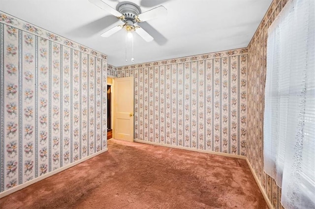 2704 Garland St, Leavenworth, KS 66048 - carpeted empty room with ceiling fan and baseboards