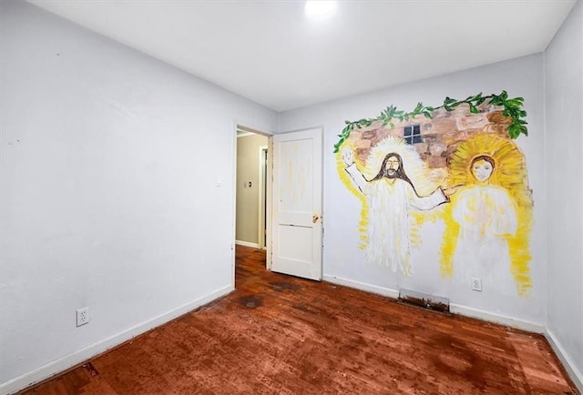 2704 Garland St, Leavenworth, KS 66048 - empty room with wood finished floors and baseboards