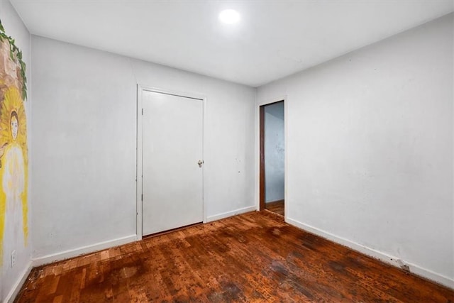 2704 Garland St, Leavenworth, KS 66048 - unfurnished bedroom featuring wood finished floors and a closet