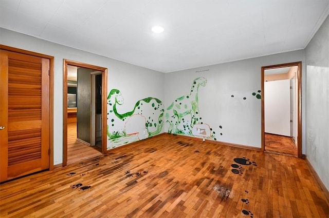 2704 Garland St, Leavenworth, KS 66048 - unfurnished room featuring hardwood / wood-style flooring and recessed lighting