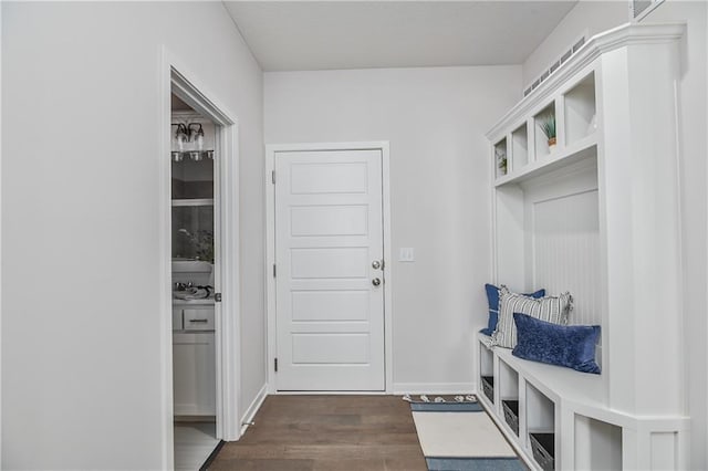 6122 Lewis Dr, Shawnee, KS 66226 - mudroom with dark wood-style flooring and baseboards