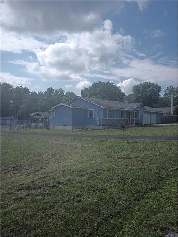1712 S Hands St, Independence, MO 64055 - view of front of house with a front lawn