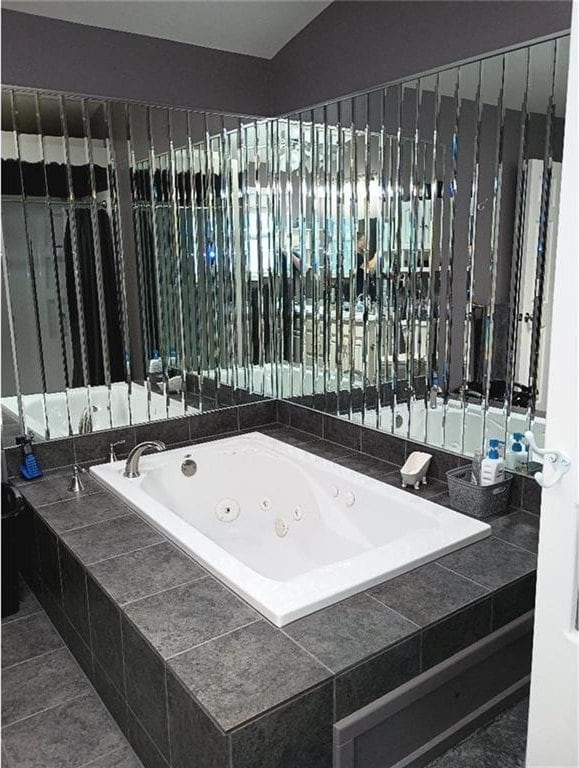 1712 S Hands St, Independence, MO 64055 - bathroom with a tub with jets
