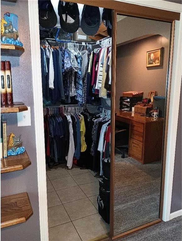 1712 S Hands St, Independence, MO 64055 - walk in closet featuring tile patterned floors