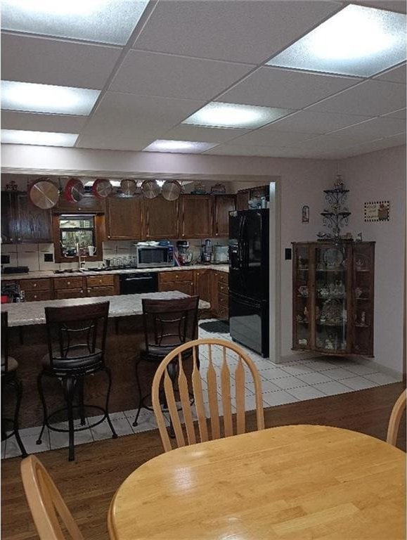 1712 S Hands St, Independence, MO 64055 - dining room featuring a drop ceiling