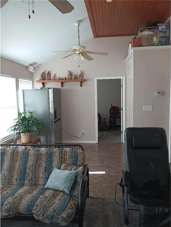 1712 S Hands St, Independence, MO 64055 - living room with a ceiling fan and lofted ceiling